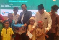 Suasana pemberian santunan kepada anak yatim piatu oleh KWP, di Ruang Abdul Muis, Kompleks Parlemen Senayan, Jakarta, pada Kamis (20/3/2025).