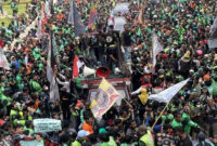 Suasana aksi aksi penyampaian aspirasi oleh mitra pengemudi, di Jakarta, Selasa (20/5/2025).