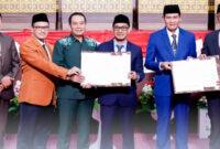 Berita acara persetujuan bersama antara DPRD dan Pemerintah Daerah, yang menandai disetujuinya 2 Raperda untuk ditetapkan menjadi Perda.