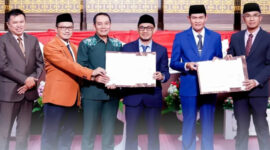Berita acara persetujuan bersama antara DPRD dan Pemerintah Daerah, yang menandai disetujuinya 2 Raperda untuk ditetapkan menjadi Perda.