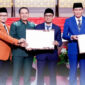 Berita acara persetujuan bersama antara DPRD dan Pemerintah Daerah, yang menandai disetujuinya 2 Raperda untuk ditetapkan menjadi Perda.