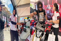 Booth pameran sepeda motor Honda menawarkan program spesial untuk pengunjung.