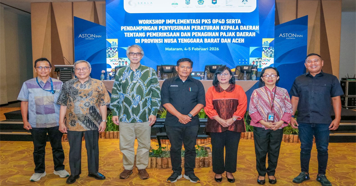 Suasana pose bersama di sela-sela kegiatan Workshop Implementasi Perjanjian Kerja Sama Optimalisasi Pemungutan Pajak Pusat dan Pajak Daerah (PKS OP4D), Kamis (5/2/2026).