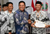 Bupati Lotim, H Haerul Warisin saat menghadiri Konferensi Kerja I PPGRI Lotim Tahun 2026, di Aula PMI Lotim, Kamis (12/2/2026).