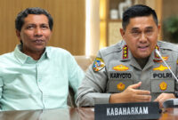 M. Sahril Amin (kiri) dan Komjen Pol Karyoto (kanan).